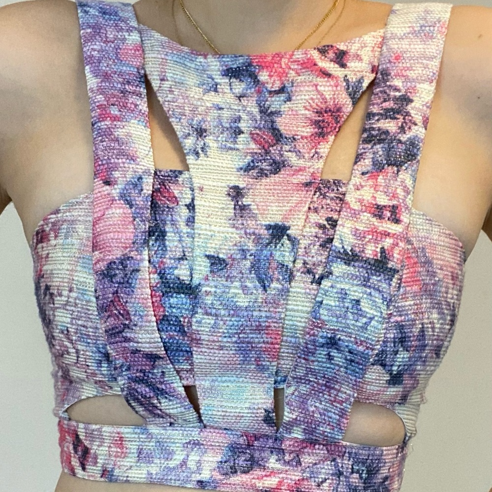 Shimmery floral cut-out crop top. By Zio New York